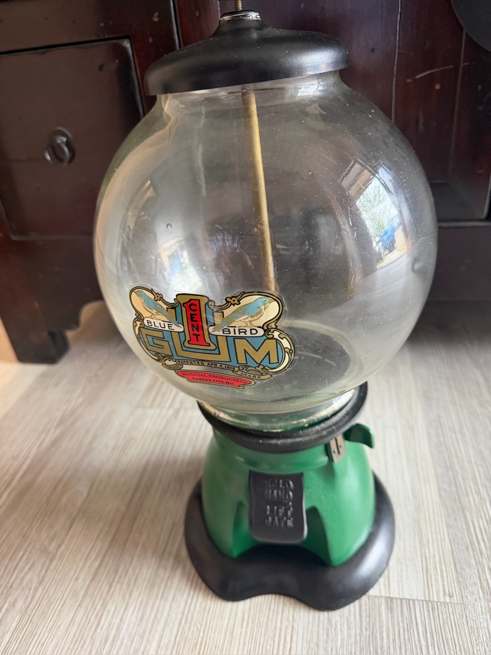 Vintage Blue Bird 1cdnt Gumball Machine - Green and black base. 17 in. tall.